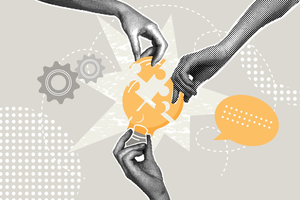Hands putting pieces of a lightbulb together